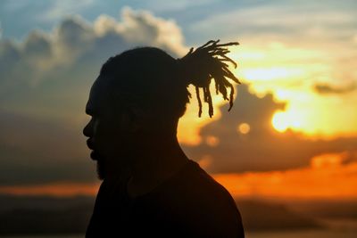 Portrait of silhouette man against sky during sunset