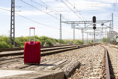 Train on railroad track against sky