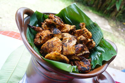 High angle view of cooked chicken meat in container