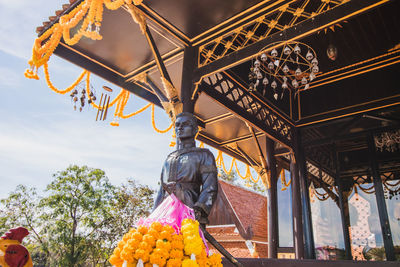 Low angle view of statue against sky