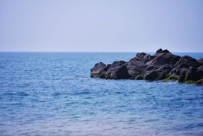 Scenic view of sea against clear sky