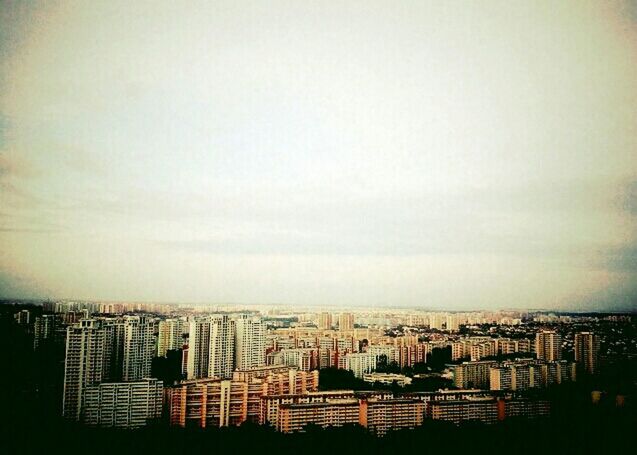 building exterior, architecture, built structure, city, cityscape, crowded, skyscraper, sky, high angle view, residential district, residential building, residential structure, tall - high, modern, office building, tower, city life, cloud - sky, development, no people