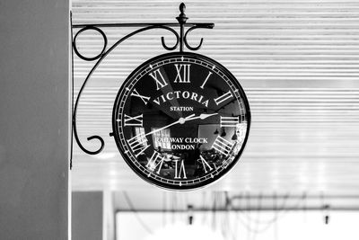 Close-up of clock on wall