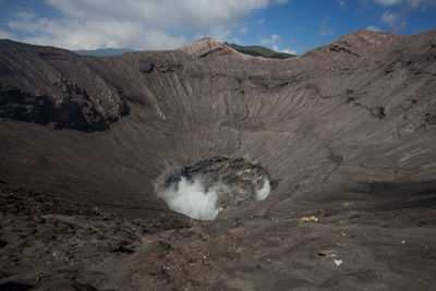 Scenic view of volcanic landscape against sky