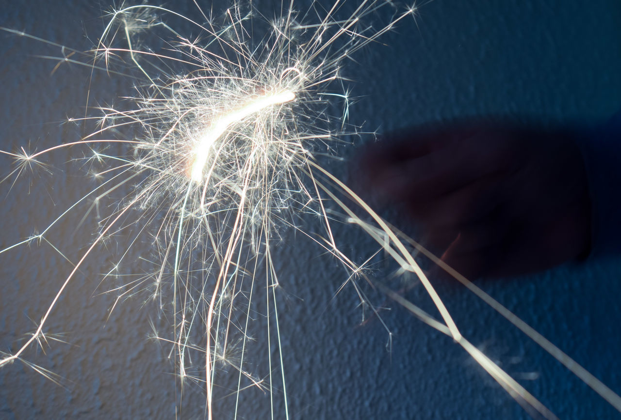 LOW ANGLE VIEW OF FIREWORKS