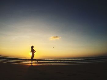 Scenic view of sea at sunset