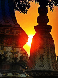 Statue of temple at sunset