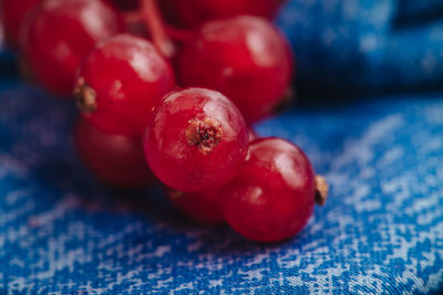 Close-up of cherries on table