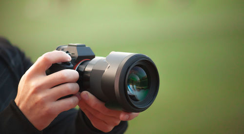 Man photographing camera