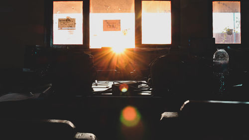 People sitting in front of window