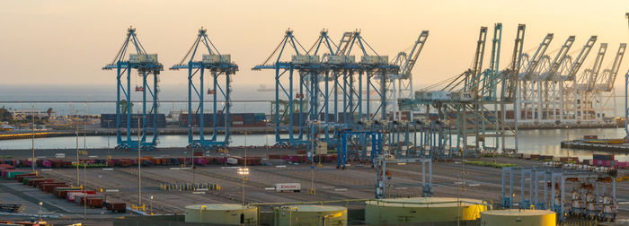 Boats moored at harbor