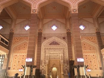 Low angle view of illuminated ceiling of building