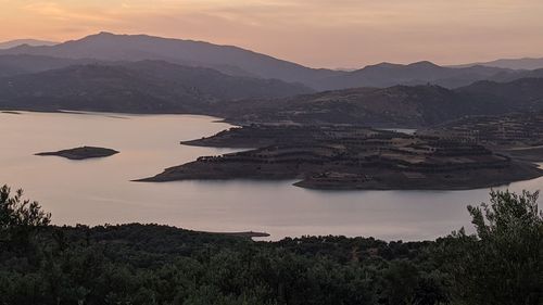 High angle view of lake against sky during sunset