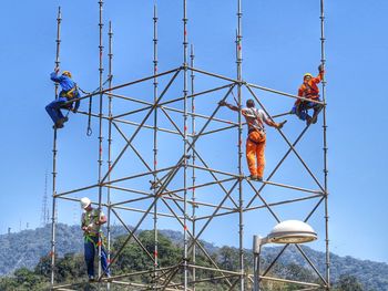 Workers on scaffolding