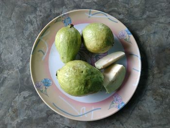 High angle view of fruits in bowl on table