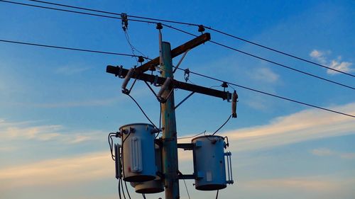 Electrical transformers on power lines used to step up line voltage