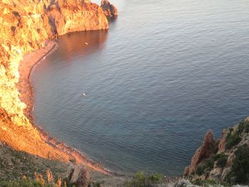 High angle view of rock formations on sea