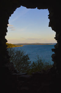 Scenic view of sea against sky at sunset