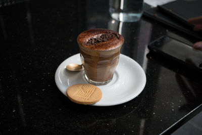 High angle view of coffee cup on table