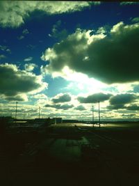 View of landscape against cloudy sky