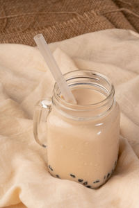 High angle view of drink in jar on table