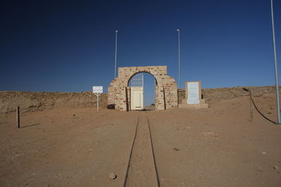 Exterior of historic building against clear blue sky