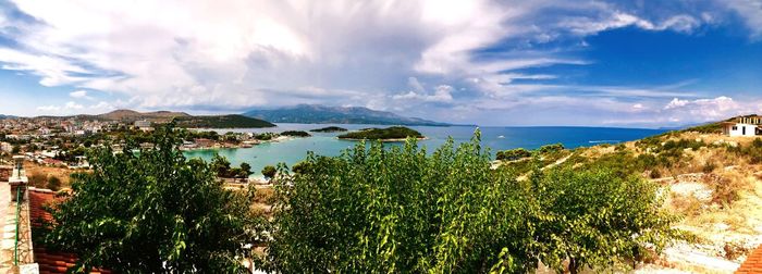 Panoramic view of bay against sky