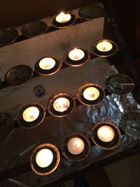 High angle view of illuminated tea light