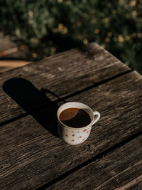 High angle view of coffee cup on table