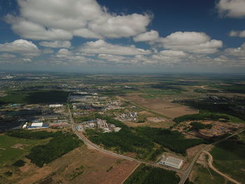 High angle view of buildings in city against sky