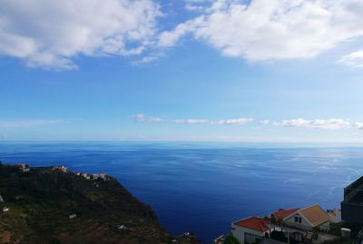 High angle view of seascape against cloudy sky