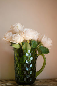 Close-up of white flowers on table