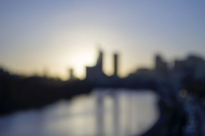 Close-up of tree against sky at sunset