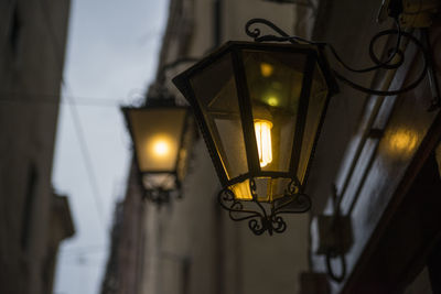 Low angle view of illuminated light bulb