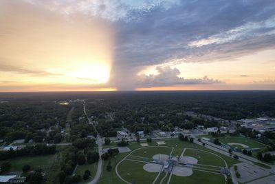 High angle view of cityscape against sky during sunset