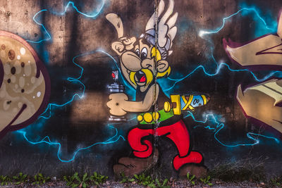 Close-up of graffiti on wall