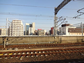 Railroad tracks against clear sky