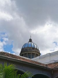 View of building against cloudy sky