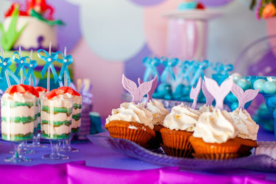 Close-up of cupcakes on table