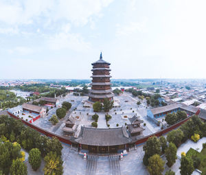 High angle view of buildings against sky