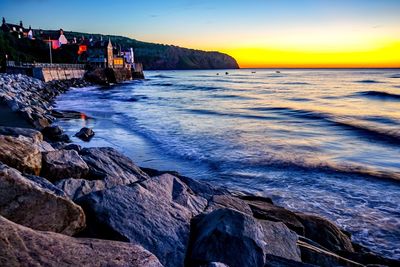 Scenic view of sea against sky during sunset