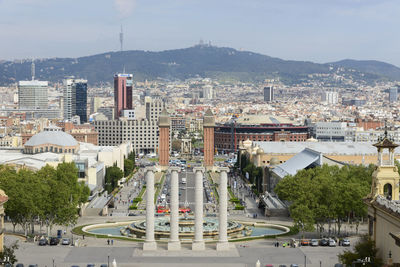 High angle view of street amidst buildings in city