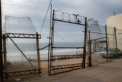 Chainlink fence against sky