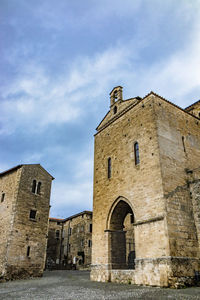 Low angle view of historic building against sky