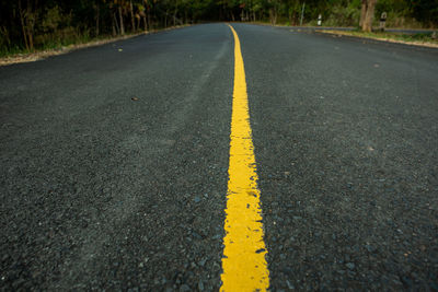 Surface level of yellow road sign