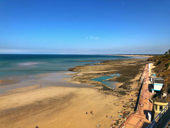 High angle view of beach against clear blue sky