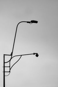 Low angle view of street light against clear sky