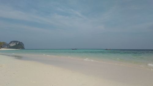 Scenic view of beach against sky