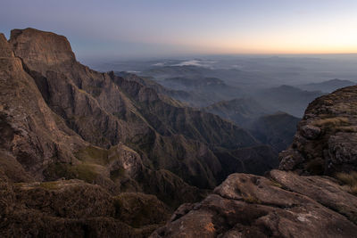 Scenic view of mountains against sky during sunset