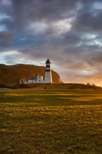 Sun setting over alnes lighthouse